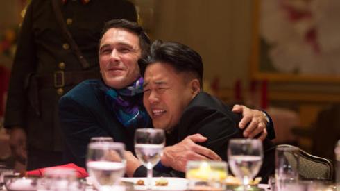 Dave and Kim enjoy a big old bro hug, (image: www.latimes.com)